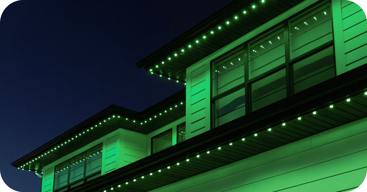 Green lighting along the roofline